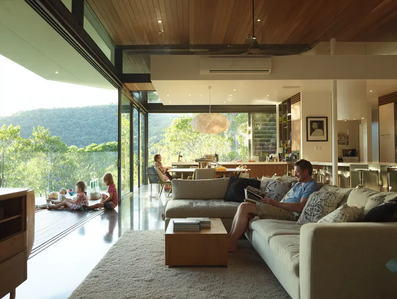 Family relaxing in a smart home — technology invisible in the background